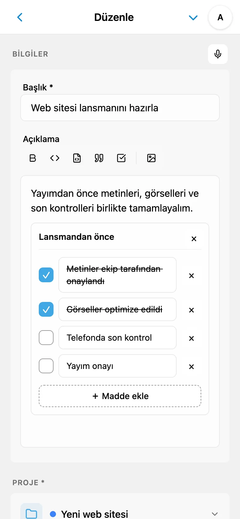 Biçimlendirme ve kod bloğu içeren görev açıklaması düzenleyicisi